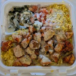 New York Gyro - Chicken tikka on rice, with cucumbers, tomatoes, and corn