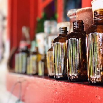 Rendezvous Diner - a row of empty bottles on a shelf - American Near Me - Greer, Arizona