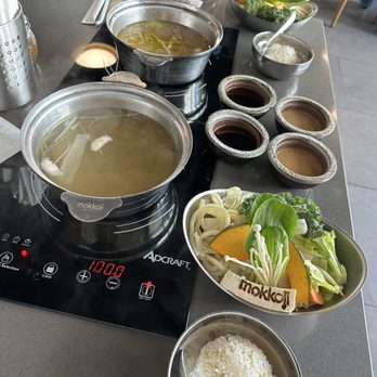 Mokkoji Shabu Shabu - Miso soup (bottom), spicy port broth (top) - Japanese Near Me - Milpitas, California Mokkoji Shabu Shabu - Miso soup (bottom), spicy port broth (top) - Japanese Near Me - Milpitas, California