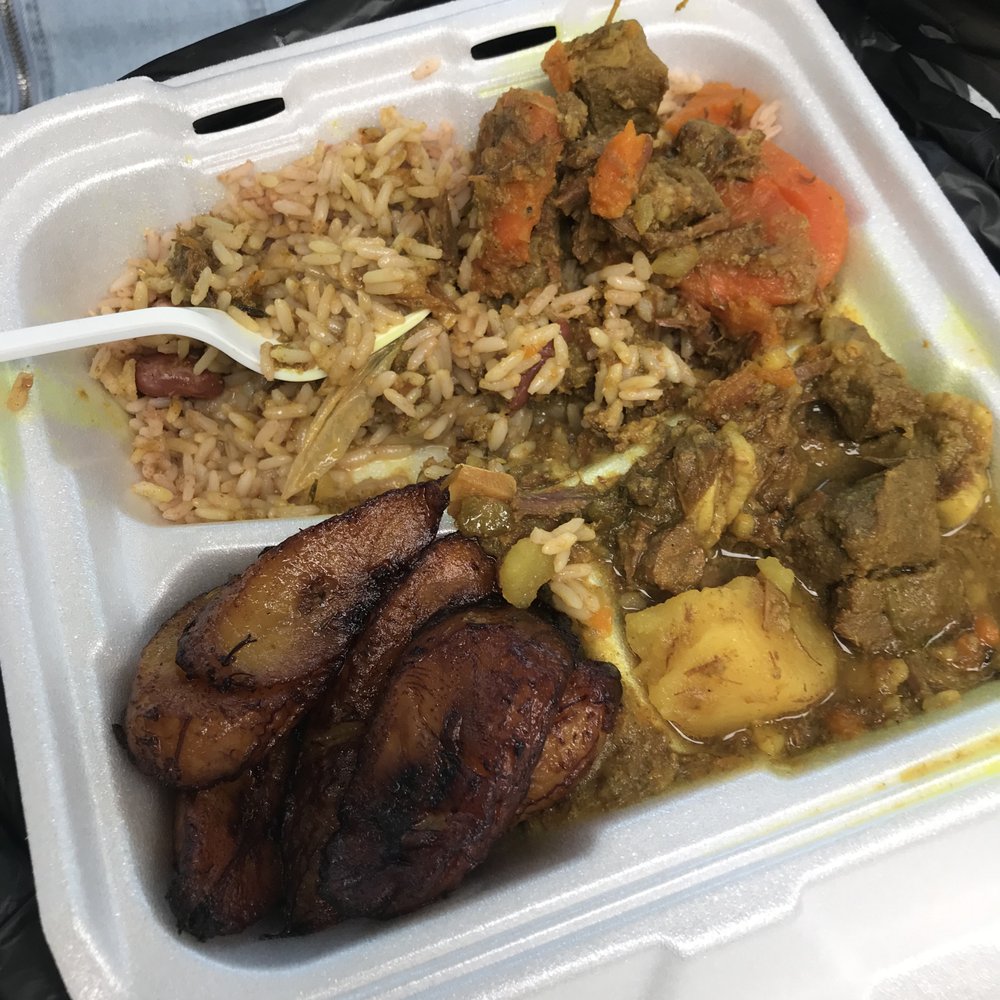 a styrofoam container of food