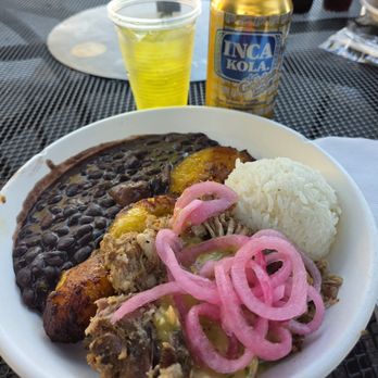 Porto's Bakery & Cafe - Tender pork with rice and beans, fried plantains for a sweet finish - Bakeries Near Me - Glendale, California Porto's Bakery & Cafe - Tender pork with rice and beans, fried plantains for a sweet finish - Bakeries Near Me - Glendale, California
