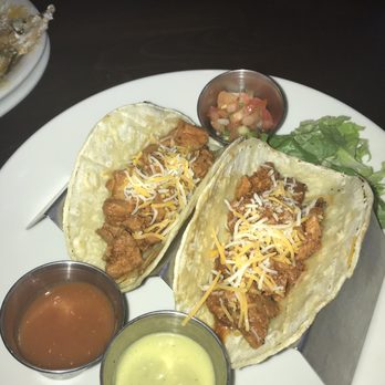 On The Kirb - Chicken Tacos- Comes with/3 different types of sauce. Chimole, Pico, and salsa - Sports Bars Near Me - Houston, Texas On The Kirb - Chicken Tacos- Comes with/3 different types of sauce. Chimole, Pico, and salsa - Sports Bars Near Me - Houston, Texas