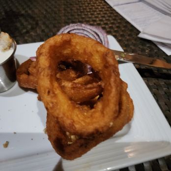 Blue Coyote Cafe - Less then HALF the onion rings that came with my chicken burger - American Near Me - Scottsdale, Arizona Blue Coyote Cafe - Less then HALF the onion rings that came with my chicken burger - American Near Me - Scottsdale, Arizona