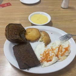 Brooks Cafe - Eggs, Tabasco sauce, scrapple, potato, cakes, hollandaise sauce, and I asked for burnt rice toast, cause it's my favorite