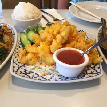 Siam Garden Cafe - Spicy stir-fry with seafood, garlic stir-fry with deep fried fish and fried calamari with a small bowl of jasmine rice - Thai Near Me - Honolulu, Hawaii Siam Garden Cafe - Spicy stir-fry with seafood, garlic stir-fry with deep fried fish and fried calamari with a small bowl of jasmine rice - Thai Near Me - Honolulu, Hawaii