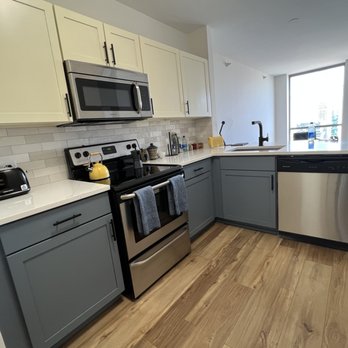 Revive 360 Renovations - a kitchen with stainless steel appliances - General Contractors Near Me - Chicago, Illinois Revive 360 Renovations - a kitchen with stainless steel appliances - General Contractors Near Me - Chicago, Illinois