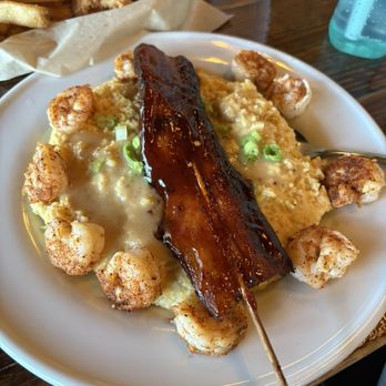 Moon Runners Saloon - South - Shrimp and grits with pork belly - Whiskey Bars Near Me - Garner, North Carolina Moon Runners Saloon - South - Shrimp and grits with pork belly - Whiskey Bars Near Me - Garner, North Carolina