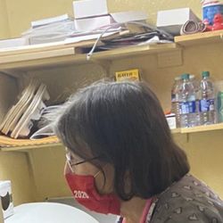 Familes First Health & Wellness Center - Employee wearing a politically charged mask