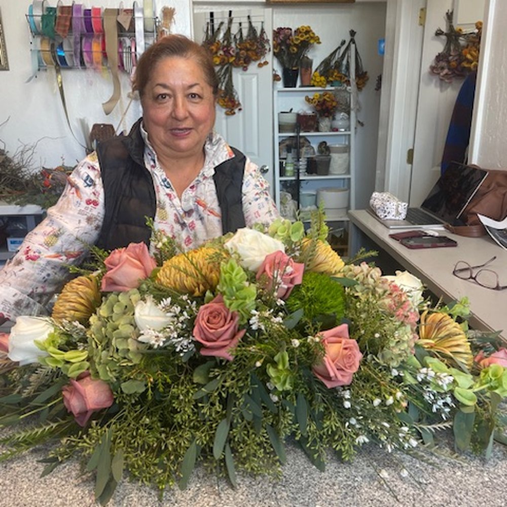 Gladys posing with the gorgeous arrangement she created for me. Gladys posing with the gorgeous arrangement she created for me.