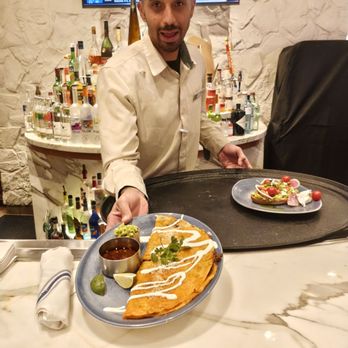 Serrano Vista Café - Surprising Mike S. while he was serving their quesobirria and avocado toast plates. A+! - Bars Near Me - Las Vegas, Nevada Serrano Vista Café - Surprising Mike S. while he was serving their quesobirria and avocado toast plates. A+! - Bars Near Me - Las Vegas, Nevada