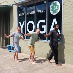 Keep Austin Well - Store owners Steve and Todd doing the "Heisman" with Ricky Williams after he taught a CBD yoga class.