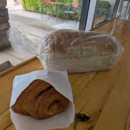 Croissant and sliced sandwich bread.