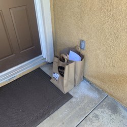 Seize Meals - Meals in paper bags on the floor.