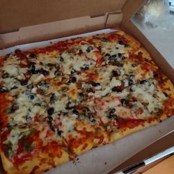 Wedgewood Fernando's Pizza - A Pizza with Green Peppers, Mushrooms and Olives. A 12 piece sheet pizza