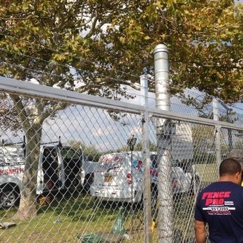Fence Pro, LI - a man standing in front of a fence - Fences & Gates Near Me - Lindenhurst, New York Fence Pro, LI - a man standing in front of a fence - Fences & Gates Near Me - Lindenhurst, New York