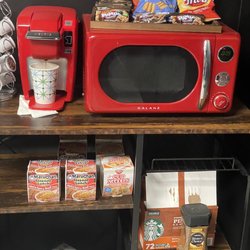 Tint Drive - Snack area with coffee and snacks and water