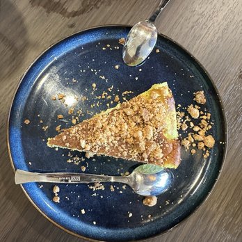 Puerta del Sol - Basque Cheesecake- pistachio cheesecake topped with almond crumble. - Tapas/Small Plates Near Me - San Jose, California Puerta del Sol - Basque Cheesecake- pistachio cheesecake topped with almond crumble. - Tapas/Small Plates Near Me - San Jose, California