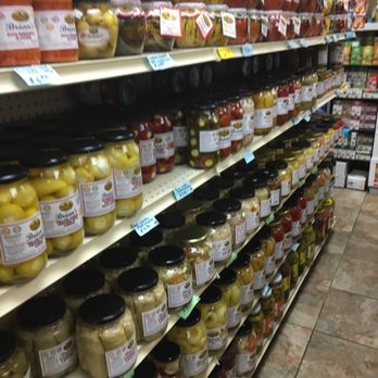Mergimtari - a grocery store aisle filled with jars of pickles - Delis Near Me - Bronx, New York Mergimtari - a grocery store aisle filled with jars of pickles - Delis Near Me - Bronx, New York