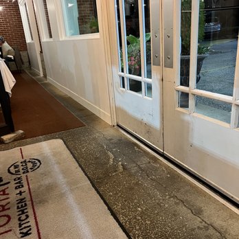 Trattoria Vaccaro - our reserved table 4 ft from doors in entrance/hallway. - Italian Near Me - Akron, Ohio Trattoria Vaccaro - our reserved table 4 ft from doors in entrance/hallway. - Italian Near Me - Akron, Ohio