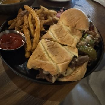 The Brick Kitchen + Lounge - Bulgogi cheese melt with seasoned fries - Beer Bar Near Me - Renton, Washington The Brick Kitchen + Lounge - Bulgogi cheese melt with seasoned fries - Beer Bar Near Me - Renton, Washington