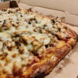 Sausage cheese onion mushroom pizza -- so thick!!