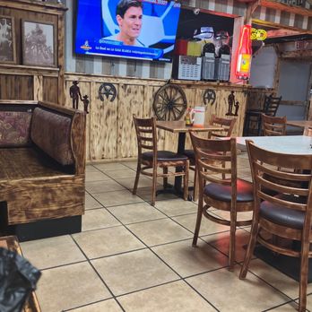 Rinconcito Latino - a television in a restaurant - Latin American Near Me - Savannah, Georgia Rinconcito Latino - a television in a restaurant - Latin American Near Me - Savannah, Georgia
