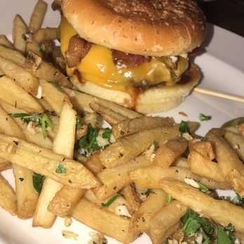 Yard House - BBQ bacon cheeseburger w/ garlic fries - New American Near Me - Sacramento, California Yard House - BBQ bacon cheeseburger w/ garlic fries - New American Near Me - Sacramento, California