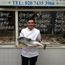 Hampstead Seafoods UK - Ryan holding a beautiful salmon