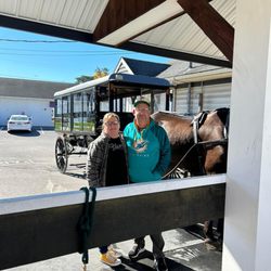 Carriage Corner Bed & Breakfast - Our picture before going on a buggy ride across a covered bridge through Amish country!