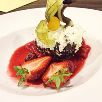 Stages Kitchen & Bar - Vanilla Bourbon Cheesecake with Wild Berry Compote. - Coffee & Tea Near Me - Edmonton, Alberta