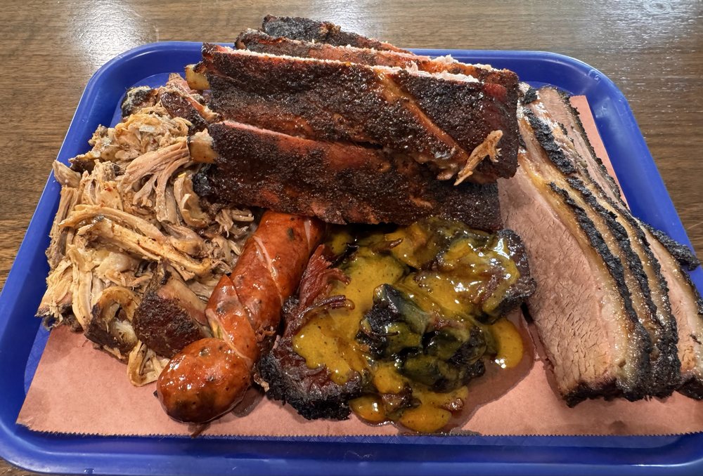 Mark's Hometown'cue Logo