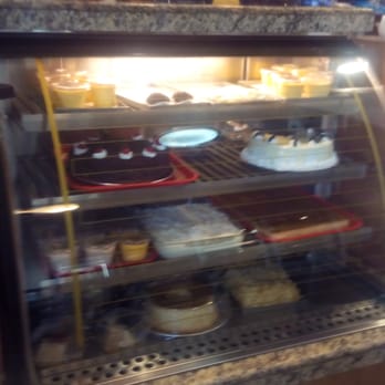 Modelo's Market Cafe - A display of all the varieties of party sized foods/cakes/savory foods - Butcher Near Me - Somerville, Massachusetts Modelo's Market Cafe - A display of all the varieties of party sized foods/cakes/savory foods - Butcher Near Me - Somerville, Massachusetts