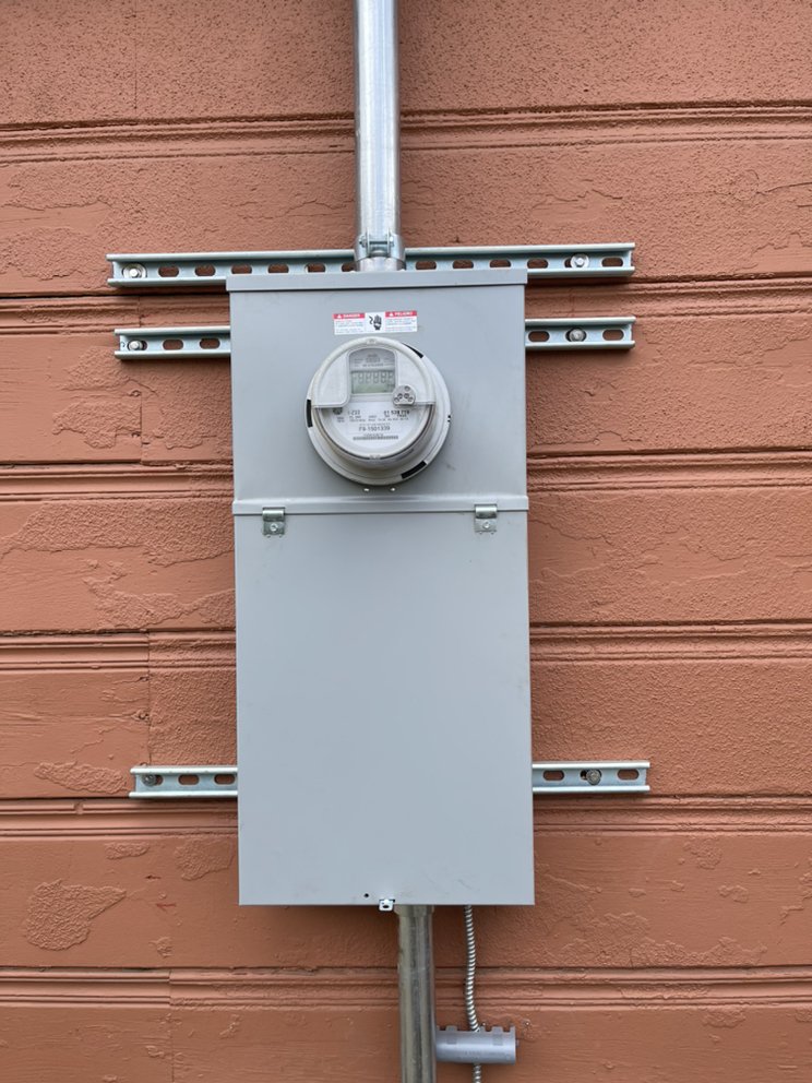 Slide of QM Electrical Services