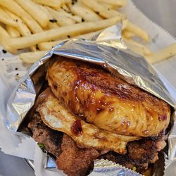 The Laughing Bull - The Ramen Burger with extra bacon and egg, and fries.