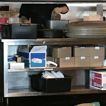 Fox River Brewing - "Chef" dumping from bag. - Breweries Near Me - Appleton, Wisconsin