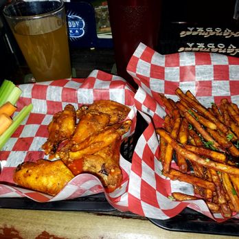 The Free Spirit - Spicy garlic wings sweet potato fries and draft beer - Sports Bars Near Me - Indianapolis, Indiana