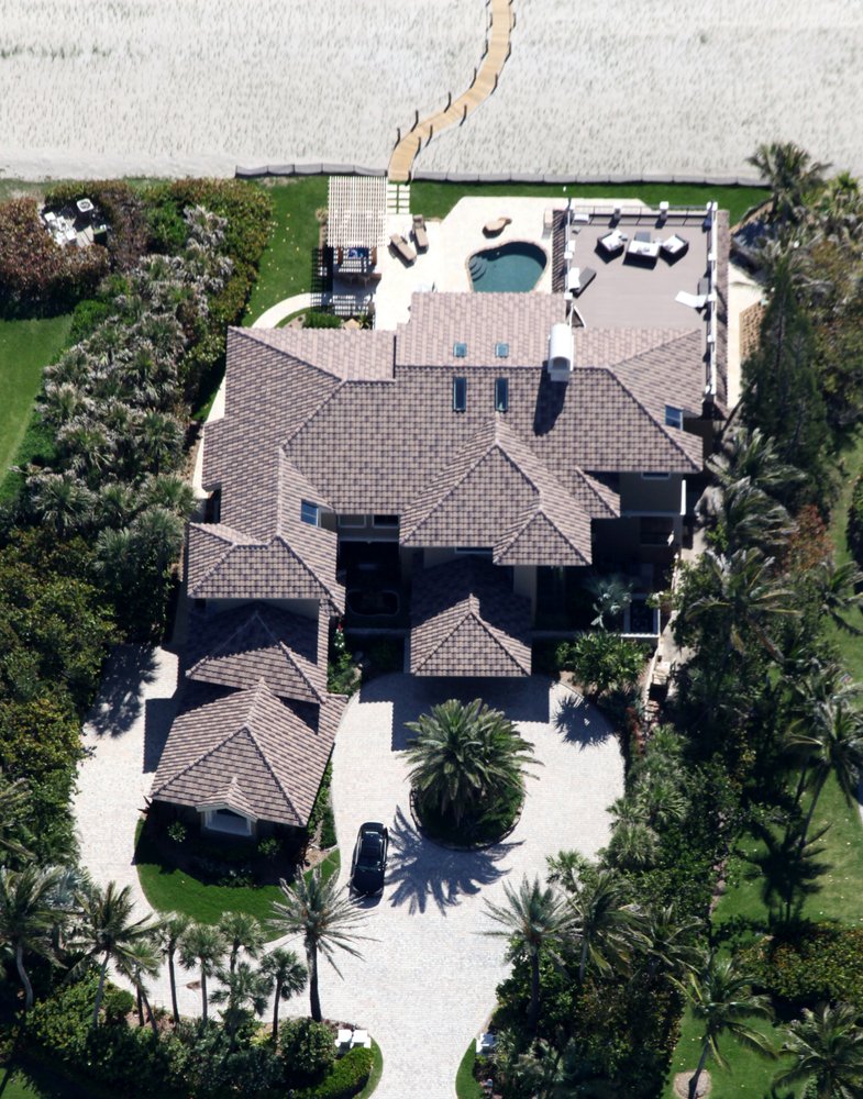 Slide of All American Roofing And Coating Of Florida