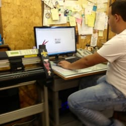 Standard Instrument Service - Joey designing a new sign with ease.  Looks awesome