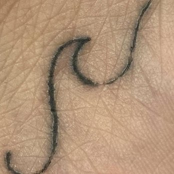 Wizz Tattoo - Fuzzy, faded and cheap looking tattoo. - Tattoo Near Me - Carolina, Puerto Rico Wizz Tattoo - Fuzzy, faded and cheap looking tattoo. - Tattoo Near Me - Carolina, Puerto Rico