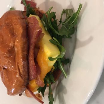 The Combine Kitchen - Big Ass Bacon and Egg Sandwich After a bite - Coffee & Tea Near Me - Rancho Cucamonga, California The Combine Kitchen - Big Ass Bacon and Egg Sandwich After a bite - Coffee & Tea Near Me - Rancho Cucamonga, California