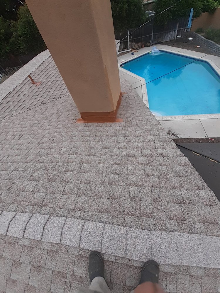 Slide of TopCal Roofing