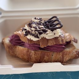 Chocolate and cherry mousse stuffed croissant