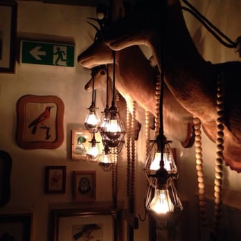 The Winery - Illuminated taxidermy greets you as you head upstairs - Wine Bars Near Me - Surry Hills, NSW