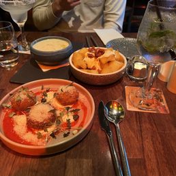 Brisket croquettes, patatas bravas, seafood chowder Brisket croquettes, patatas bravas, seafood chowder
