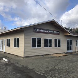 Strohmeier's Auto Center - Open during construction. New store front