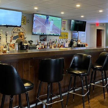 The Tipsy Tomato - a row of bar stools - Bars Near Me - Manitowoc, Wisconsin The Tipsy Tomato - a row of bar stools - Bars Near Me - Manitowoc, Wisconsin