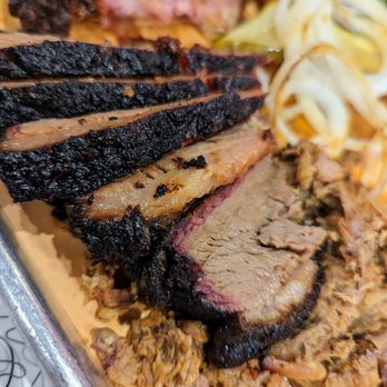 The Original Q Shack - Close-up of Chili-Rubbed Beef Brisket, sliced. Part of our Three Meat Combo. $22.95. - Barbeque Near Me - Durham, North Carolina The Original Q Shack - Close-up of Chili-Rubbed Beef Brisket, sliced. Part of our Three Meat Combo. $22.95. - Barbeque Near Me - Durham, North Carolina