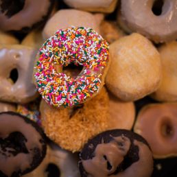 a heap of beautiful, delicious donuts. a heap of beautiful, delicious donuts.