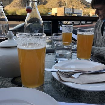 Base Pizzeria - Oak Creek Hefeweizens complimenting the Phoenix Mountains during golden hour - Pizza Near Me - Phoenix, Arizona