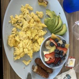 3 eggs ,side of Fruit, sourdough Toast, chicken sausage, & avocado on the siiiiide. 3 eggs ,side of Fruit, sourdough Toast, chicken sausage, & avocado on the siiiiide.